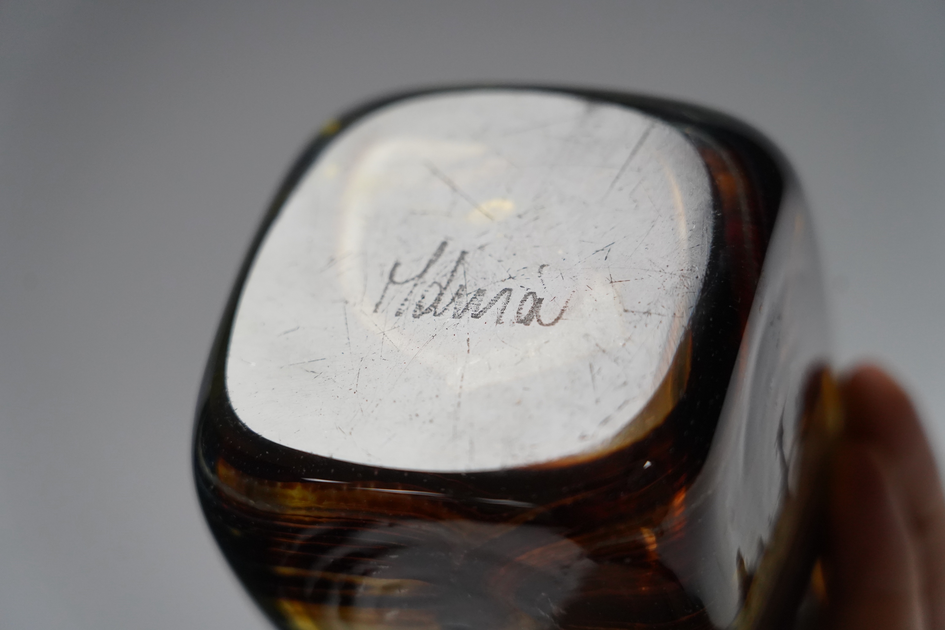 A collection of thirty pieces of Mdina glassware, comprising paperweights and vases, largest 13cm high